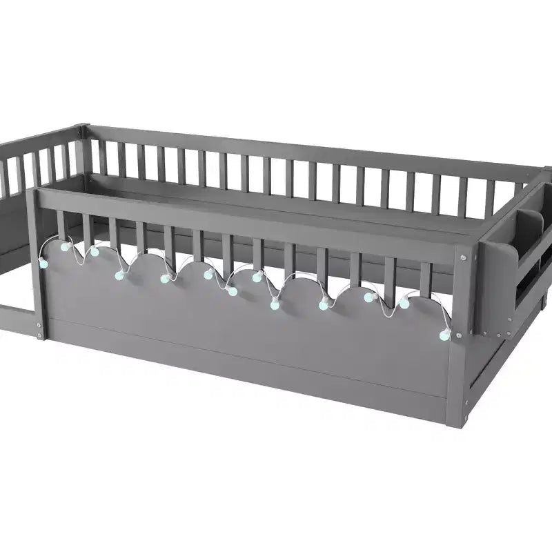 Lit de sol moderne avec des barrières de sécurité hautes, des lumières LED et des étagères de rangement.